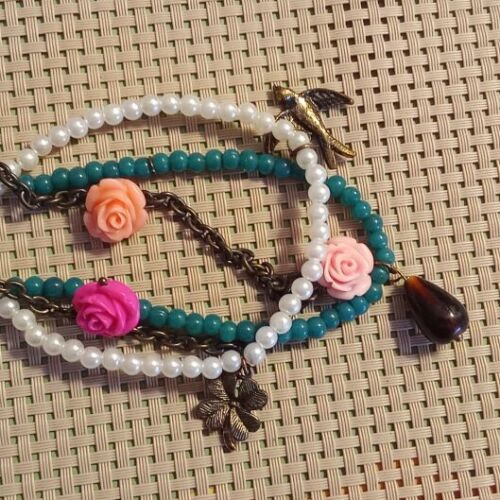 Handmade bracelet with pearls, turquoise beads and charms
