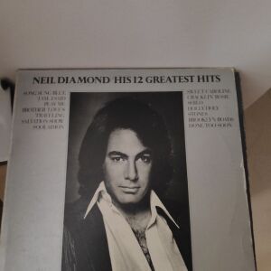Neil diamond greatest hits + And the singer sings his songs